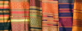 http://static.asiawebdirect.com/m/bangkok/portals/bangkok-com/homepage/shopping-fabric-textiles/TopPageContent/0/BigImage/thai-silk.jpg